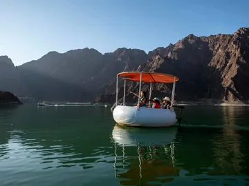 Top 5 Boating Activities in UAE - Donut boat ride at Hatta Dam